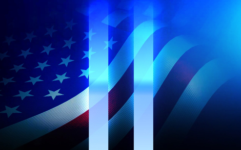 American flag in front of the World Trade Center towers